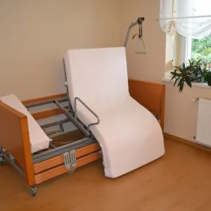 Obrotowe łóżko rehabilitacyjne TWIST funkcja fotela i pionizacji